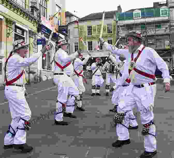 A Group Of People Dancing The Morris, Wearing Colorful Costumes And Waving Handkerchiefs. The Traditional Games Of England Scotland And Ireland : Oats And Beans Would You Know Together With A Memoir On The Study Of Children S Games Volume II (Illustrated)