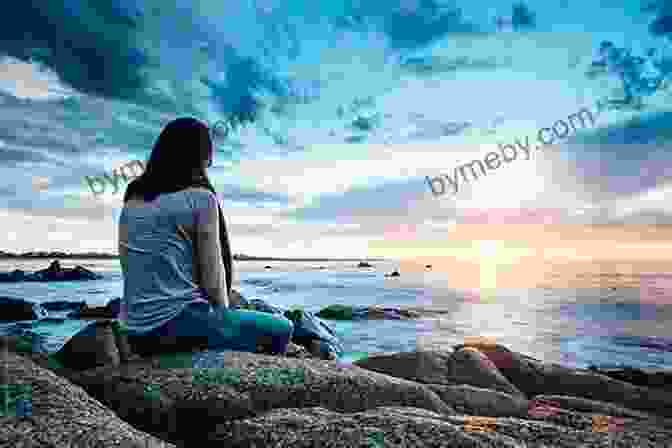 A Person Sitting On A Beach, Looking Out At The Ocean Memories Of Antigua: Bugs Bicycle Pumps Beaches And Blessings