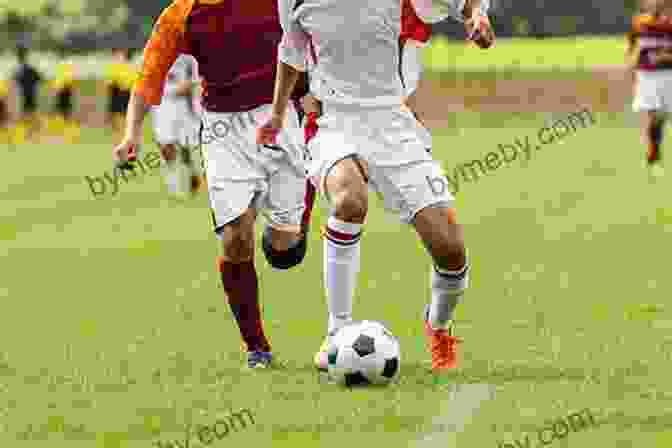 A Soccer Player Dribbling The Ball Past An Opponent During An Intense Match On A Lush Green Field TM 21 220 Sports And Games 1942: Topics: Badminton Baseball Basketball Bowling Boxing Handball Horseshoes Soccer Softball Speedball Table Tennis Tennis Touch Football Track And Field