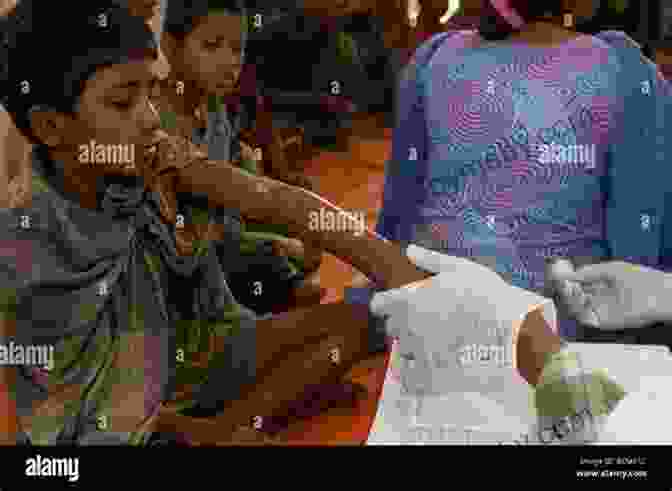 A Street Child Receiving Medical Attention From A Healthcare Worker THE PHENOMENON OF STREET CHILDREN: Human Trafficking And Exploitation Of Orphans Abndoned And Less Privileged Children (Mandela Press Limited 426043)