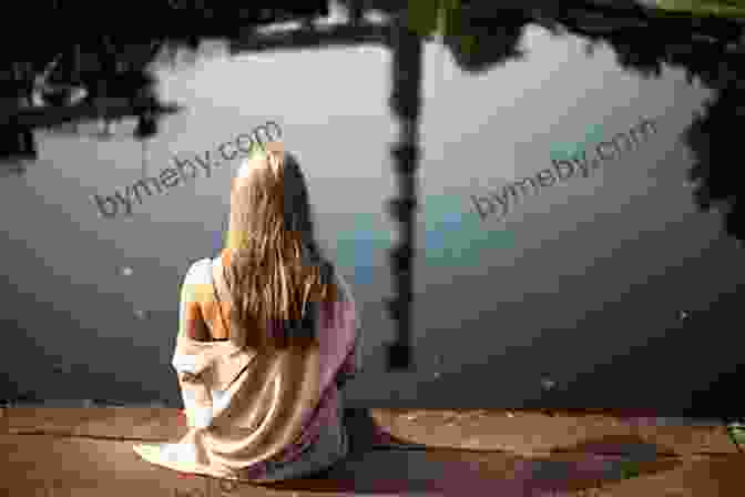 A Woman Sitting Alone In Contemplation By A Tranquil Lake, Surrounded By Nature, Conveying The Introspective And Reflective Nature Of The Journey Joy Of Our Life: A Love Of Adventure