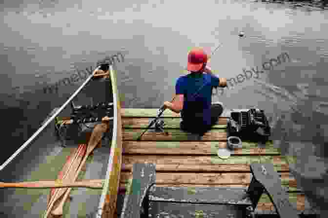 A Young Boy Fishing On A Tranquil Lake, With The Sun Setting In The Background Rafts Raccons Revelations: Growing Up On A Great Lake