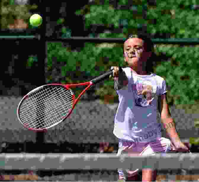 A Young Tennis Player Raises Her Arms In Victory, Her Face Beaming With Pride Love All: First Set Susan Shelby Torrance