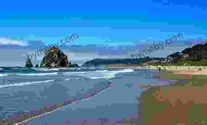 Haystack Rock, A Towering Sea Stack At Cannon Beach, Oregon, With Beachgoers Enjoying The Sun And Surf. Treasure Tales Of The Oregon Coast