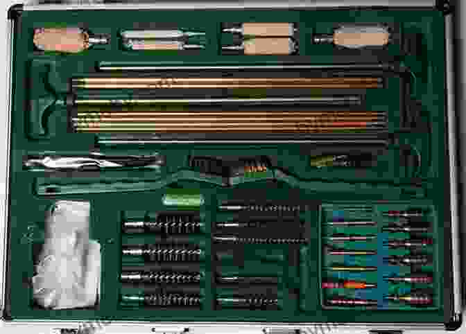 Image Of A Hunter Using A Cleaning Kit To Maintain The Barrel Of A Hunting Rifle. Shooter S Bible Guide To The Hunting Rifle And Its Ammunition