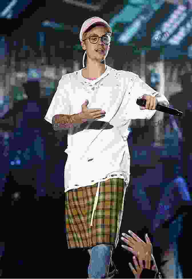 Justin Bieber Performing On Stage During His Purpose Tour FAME: Justin Bieber Tara Broeckel Ooten