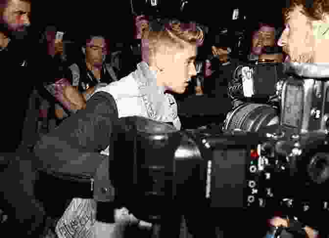 Justin Bieber Surrounded By Paparazzi During His Early Years Of Fame FAME: Justin Bieber Tara Broeckel Ooten