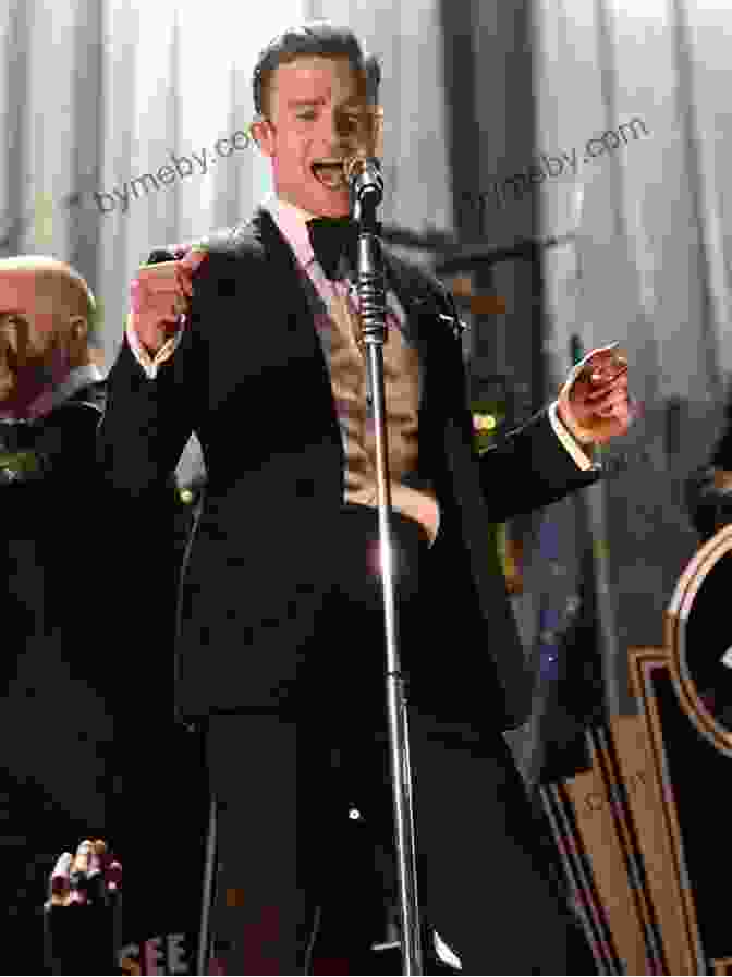 Justin Timberlake Singing Into A Microphone With A Crowd Behind Him 101 Amazing Justin Timberlake Facts Stella Benson