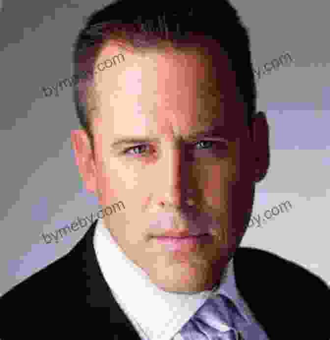 Vince Flynn Author Photo | Vince Flynn, Wearing A Black Suit And Tie, Smiles Slightly Protect And Defend: A Thriller (Mitch Rapp 10)